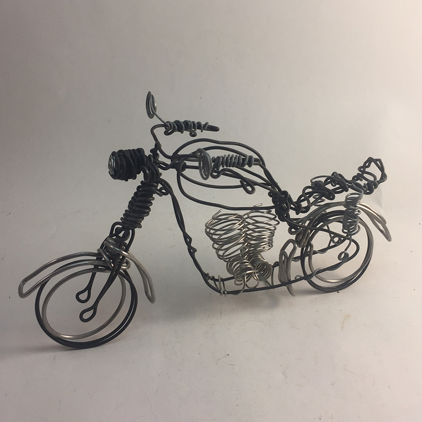 black wire motorcycle with silver shocks